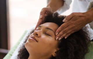 Woman getting a massage to relieve stress.