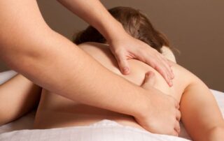 woman getting a massage from a licensed massage therapist