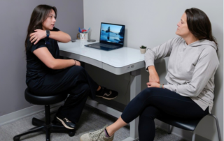 Preventative healthcare discussion about workplace movement and ergonomics